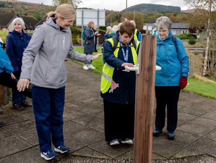 Individuals at the launch try out the Strength and Balance exercises.